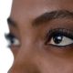 Close up of a woman's dark brown eyes