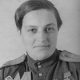 Black and white photo from the 40's of Lyudmila_Pavlichenko in uniform with many medals
