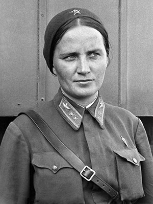 Black and white photo of of Marina Raskova in uniform, 1938