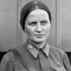 Black and white photo of of Marina Raskova in uniform, 1938